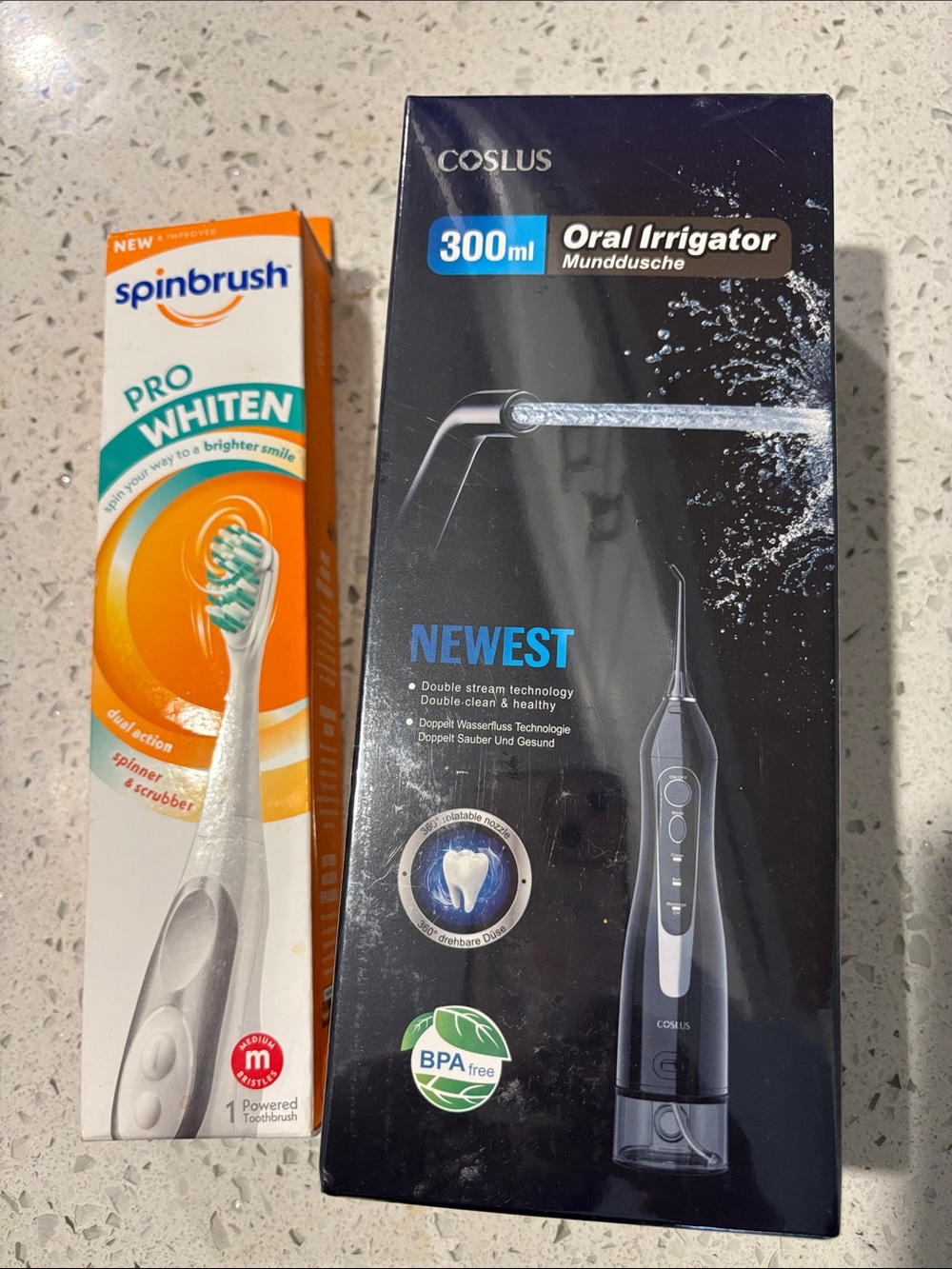 New COSLUS 300ml Oral Irrigator - Black plus free Spinbrush Bundle